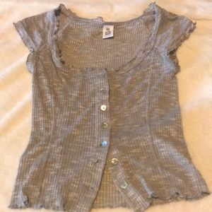 grey and white top with buttons